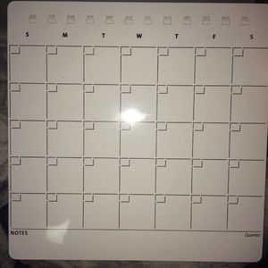 Whiteboard calendar with marker